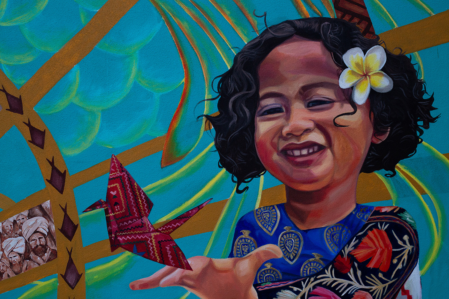 Closeup of child from AAPI+ mural