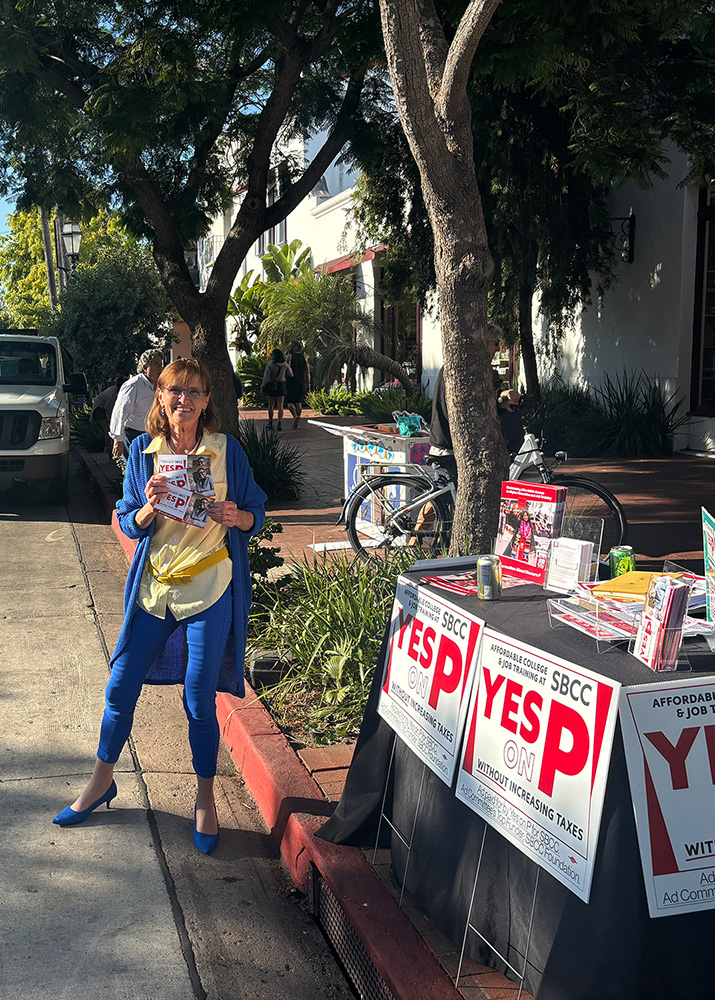 Cornelia at Farmer's Market Volunteering for Measure P